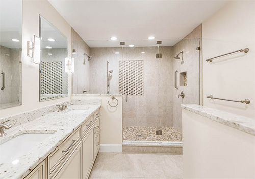 Renovated home restroom with walk-in shower and two sinks, done for bathroom remodeling near Arlington, Virginia.