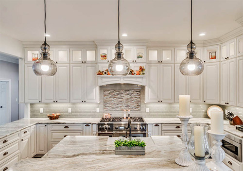 White custom kitchen cabinets near Ashburn, Virginia installed by Abbey Design + Remodel.