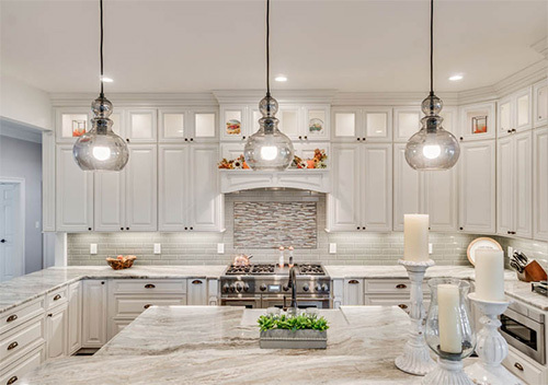 Remodeled kitchen with white cabinets and new counters set up as part of our house renovation near Aldie, VA.