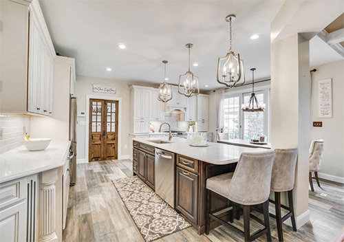 New kitchen island with cloth-covered stools, one of our Aldie kitchen remodel projects.